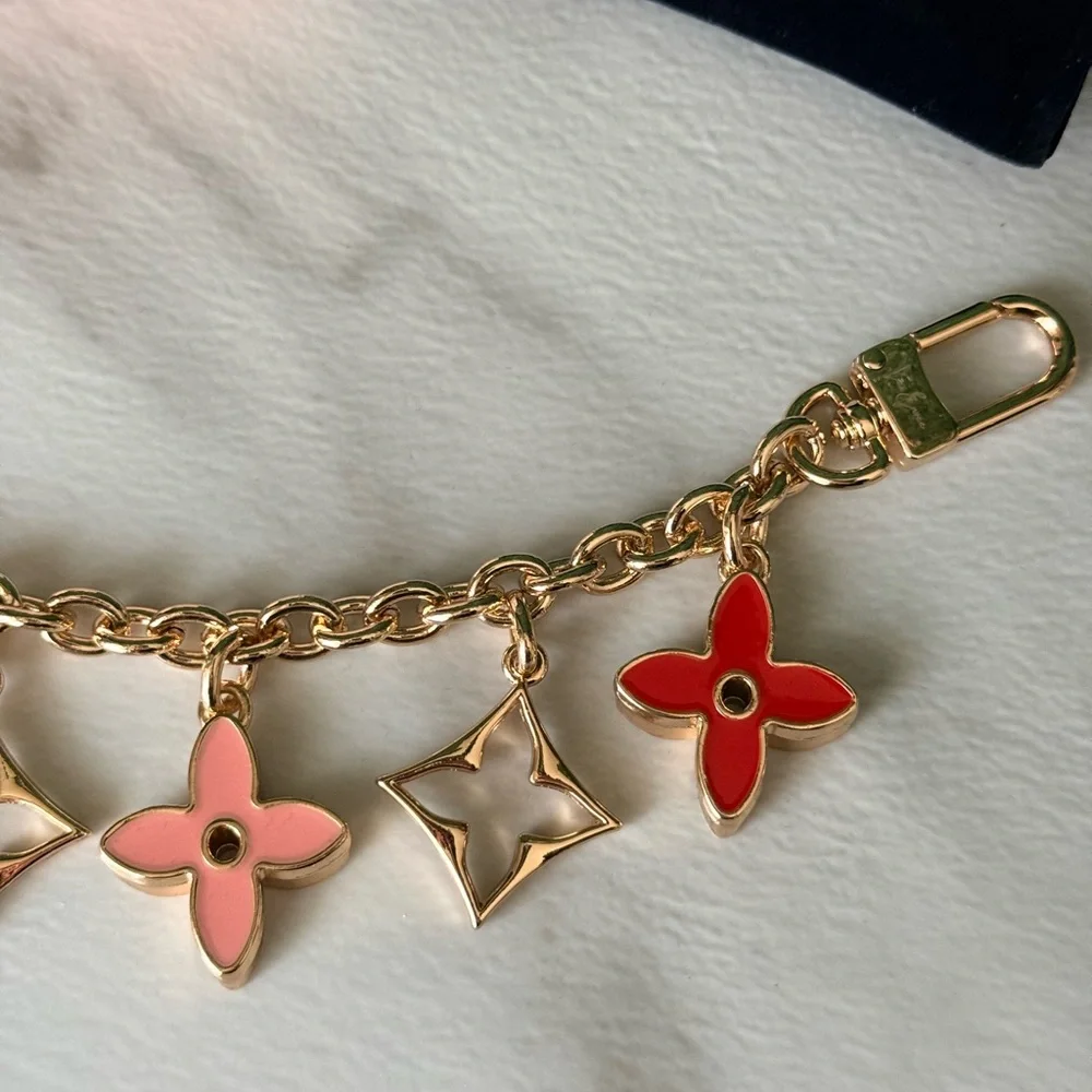 Lux Envee Gold Chain Bag Charm with Red and Pink Flower Charms